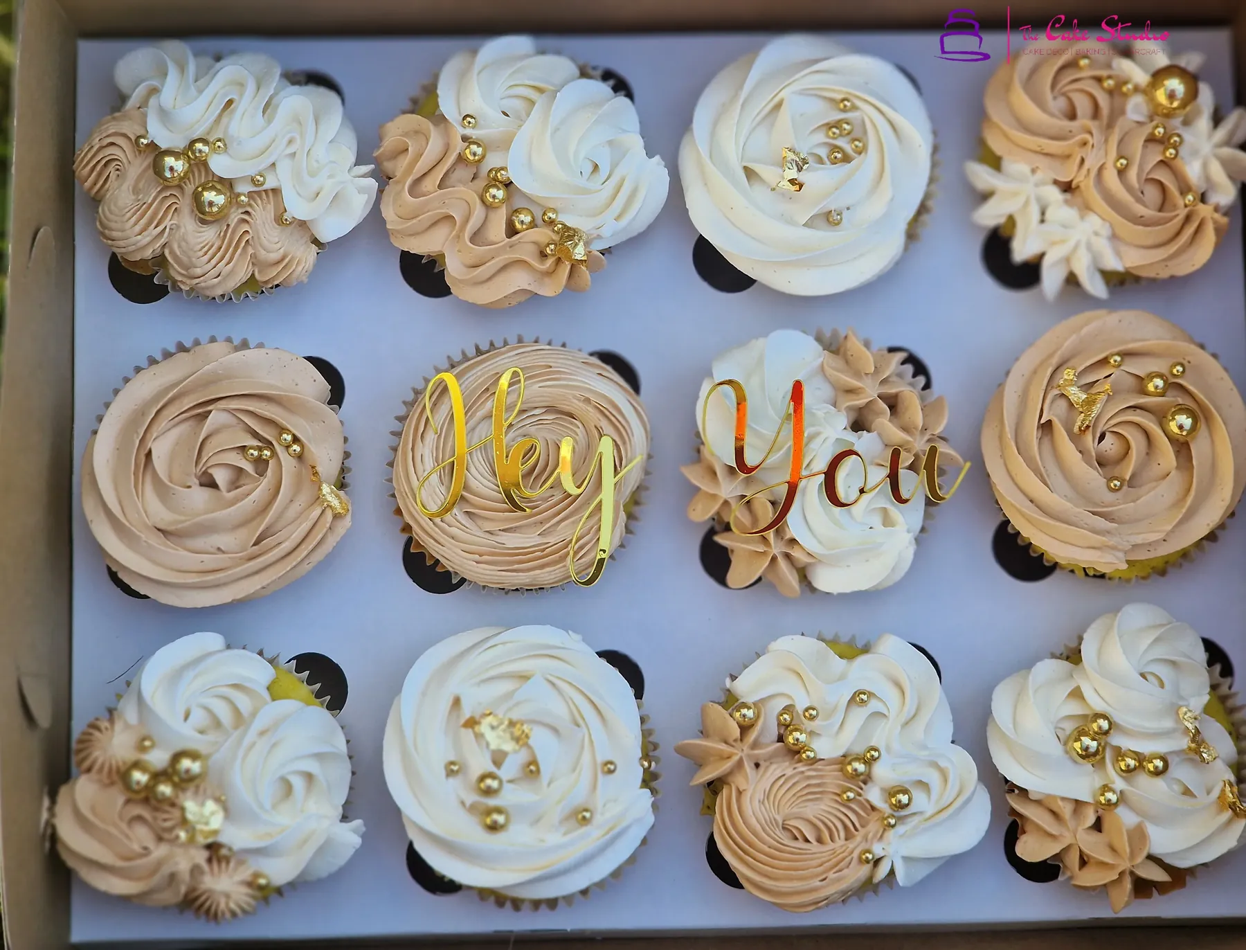 A box of buttercream-piped cupcakes from The Cake Studio Harare