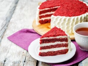 Red velvet cake on a white wood background. the toning. selective focus